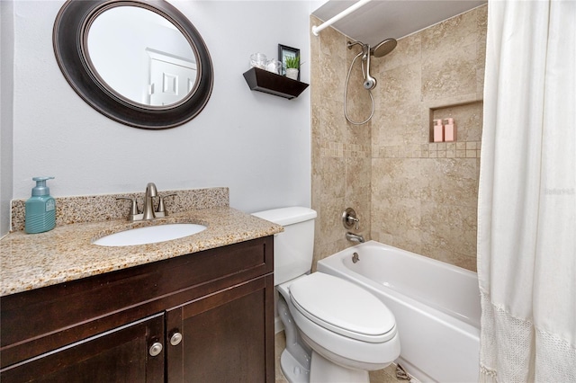 full bath featuring vanity, shower / bath combination with curtain, and toilet