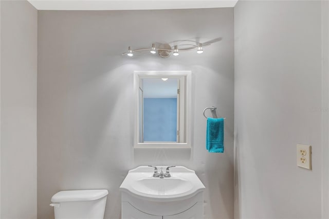 half bath with toilet and vanity