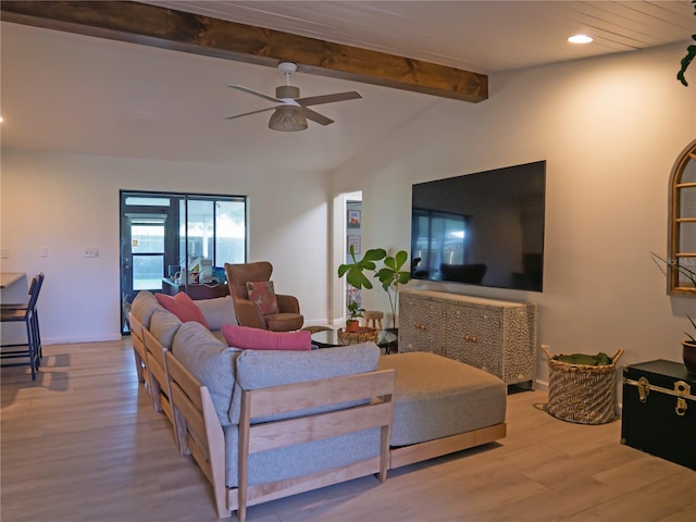 living room featuring vaulted ceiling with beams, wood finished floors, recessed lighting, and ceiling fan