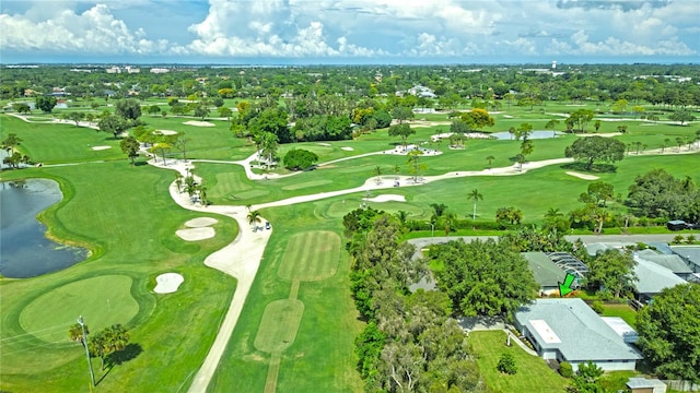 bird's eye view with golf course view and a water view