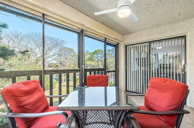 sunroom / solarium with ceiling fan