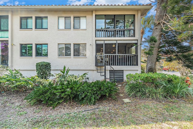 view of front of house featuring stucco siding