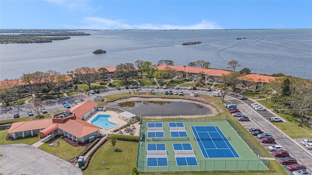 birds eye view of property featuring a water view