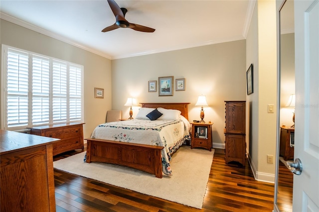 bedroom with baseboards, ceiling fan, crown molding, and hardwood / wood-style flooring