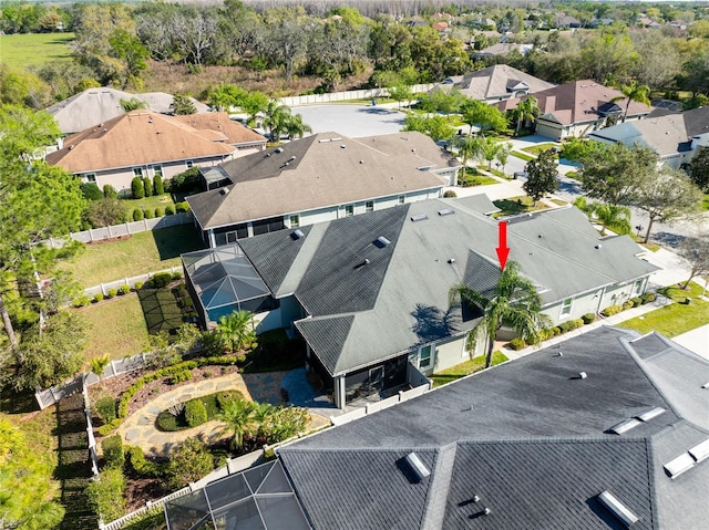 birds eye view of property with a residential view