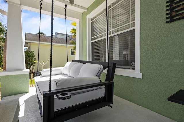 exterior space with a porch and an outdoor hangout area