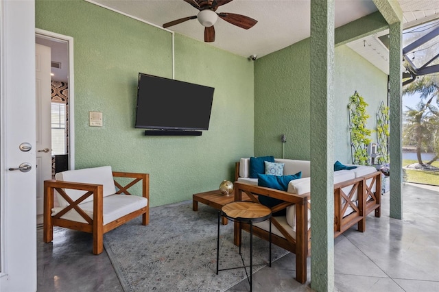 view of patio / terrace with a ceiling fan and outdoor lounge area