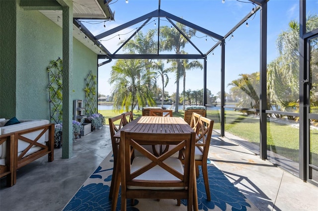 sunroom with a water view