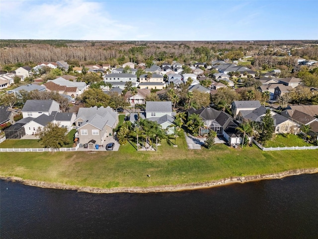 aerial view with a residential view and a water view