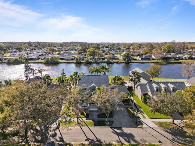 bird's eye view featuring a residential view and a water view