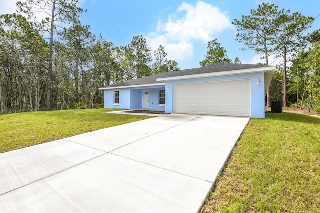 ranch-style home featuring a front yard, an attached garage, driveway, and stucco siding