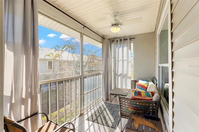 sunroom / solarium with ceiling fan