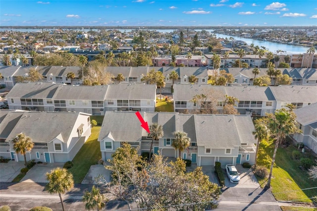 aerial view featuring a residential view and a water view