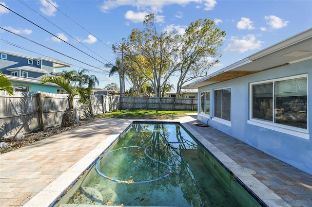 2451 Baywood Dr W, Dunedin, FL 34698 - view of pool featuring a patio and a fenced backyard