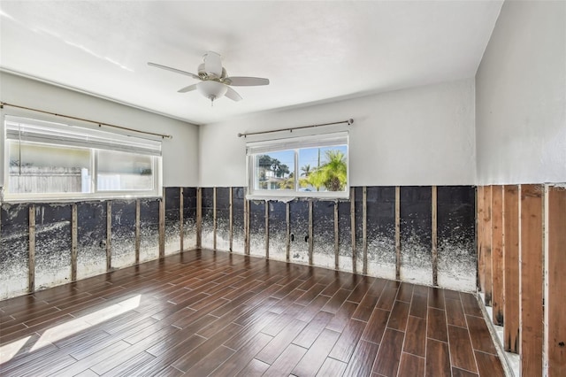2451 Baywood Dr W, Dunedin, FL 34698 - spare room featuring a ceiling fan and wood tiled floor