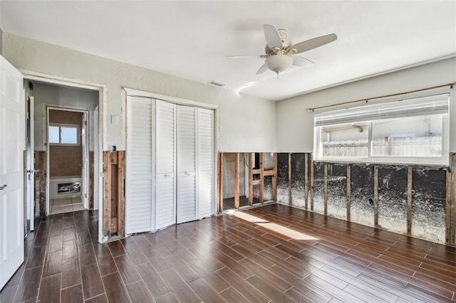 2451 Baywood Dr W, Dunedin, FL 34698 - unfurnished bedroom featuring a closet, visible vents, a ceiling fan, and wood finish floors