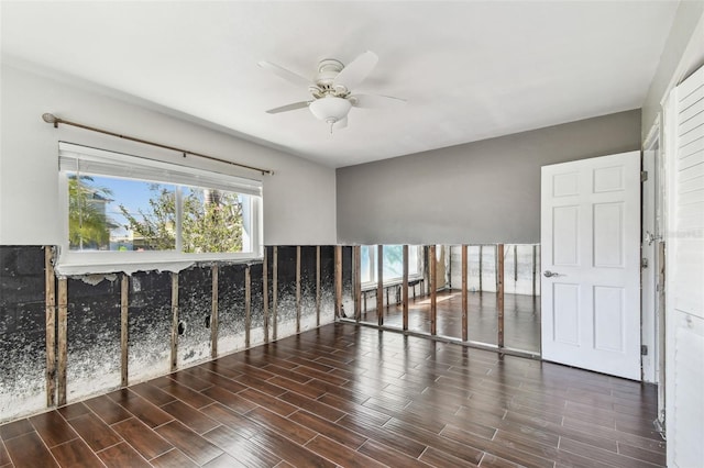 2451 Baywood Dr W, Dunedin, FL 34698 - unfurnished room featuring a ceiling fan and wood tiled floor