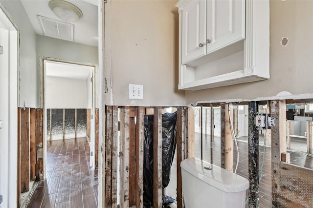 2451 Baywood Dr W, Dunedin, FL 34698 - interior space featuring visible vents, attic access, and wood tiled floor