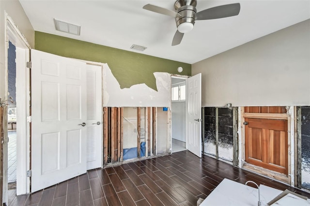 2451 Baywood Dr W, Dunedin, FL 34698 - interior space featuring visible vents, ceiling fan, and wood tiled floor