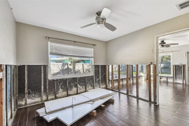 2451 Baywood Dr W, Dunedin, FL 34698 - miscellaneous room with visible vents, wood finished floors, and a ceiling fan