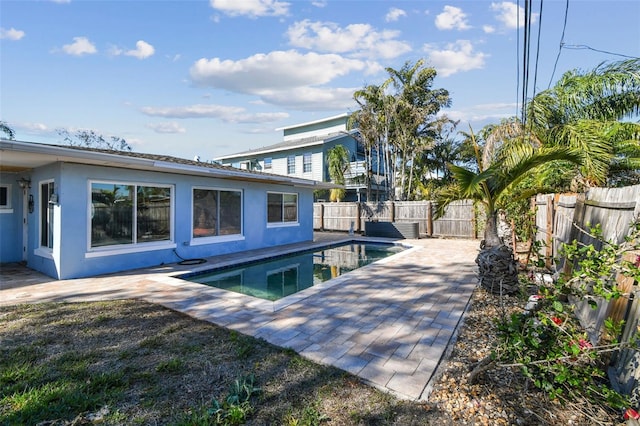 2451 Baywood Dr W, Dunedin, FL 34698 - view of swimming pool with a fenced in pool, a fenced backyard, and a patio area