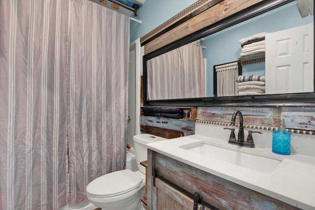 full bathroom with toilet, vanity, and shower / bath combination with curtain