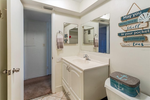 bathroom with vanity, tile patterned floors, toilet, and visible vents