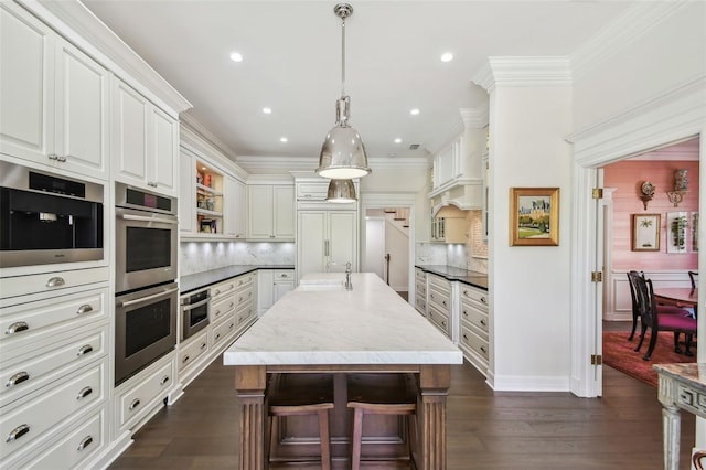 kitchen featuring stainless steel double oven, open shelves, a sink, crown molding, and backsplash