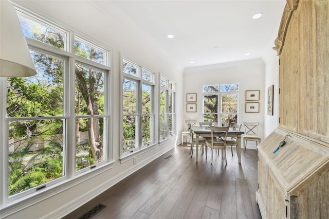 sunroom featuring visible vents