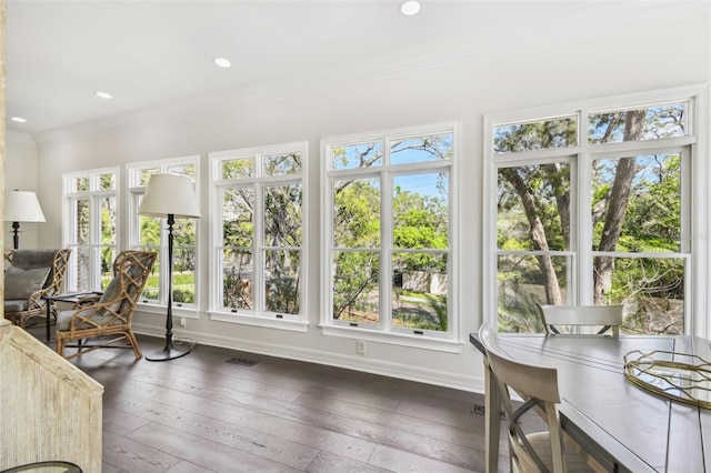 sunroom featuring visible vents