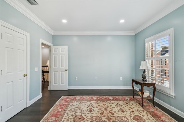 interior space featuring dark wood-style floors, visible vents, and baseboards