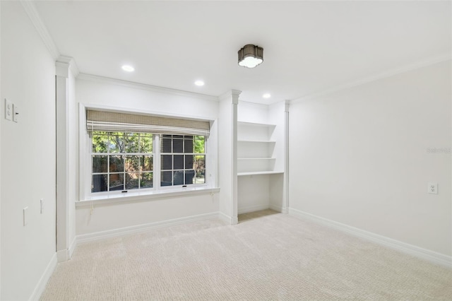 empty room with recessed lighting, baseboards, ornamental molding, and carpet flooring