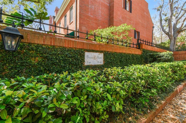 view of property exterior featuring brick siding