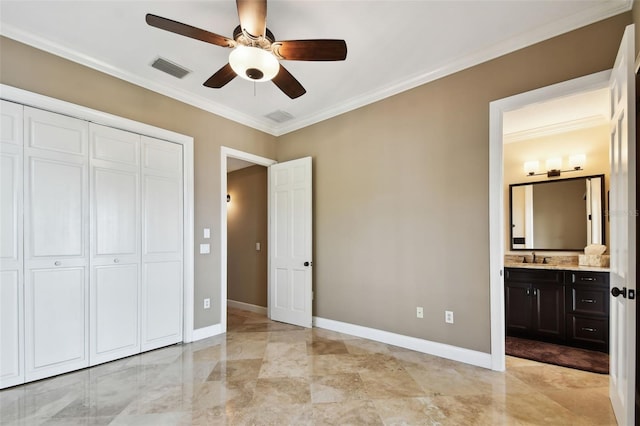 unfurnished bedroom with crown molding, visible vents, baseboards, and a closet