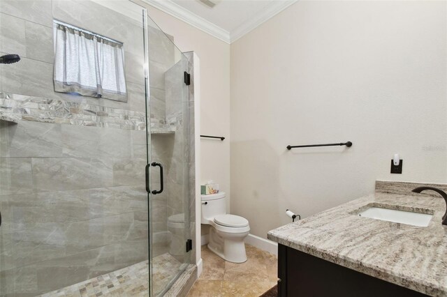 full bathroom featuring vanity, toilet, a stall shower, and ornamental molding