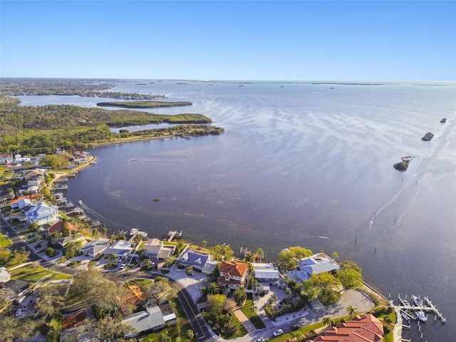 birds eye view of property featuring a residential view and a water view