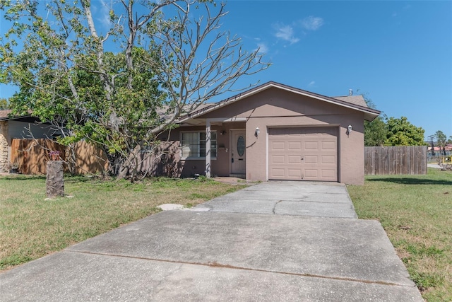 single story home with a front yard, fence, stucco siding, concrete driveway, and a garage