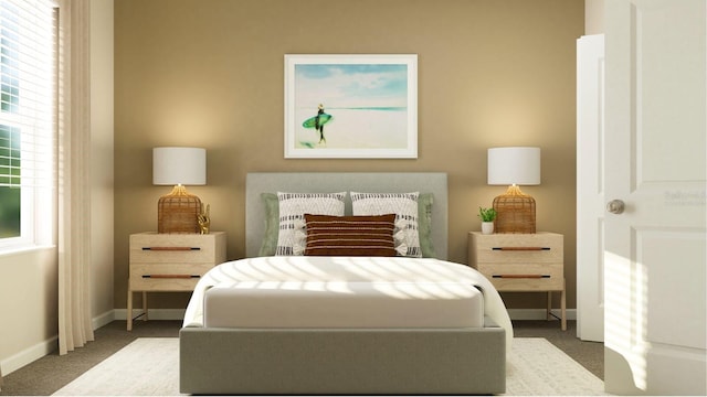 carpeted bedroom featuring baseboards