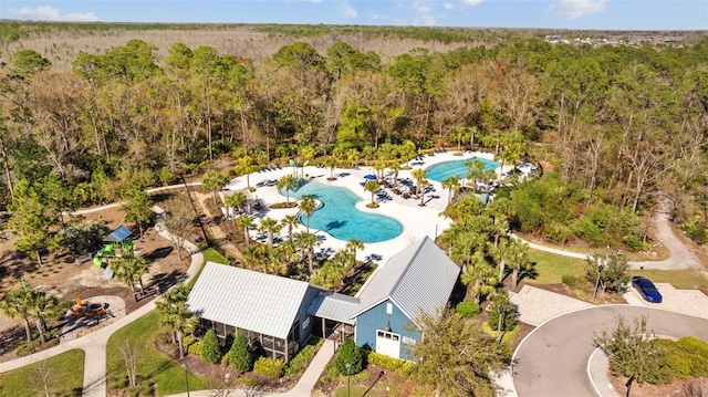 bird's eye view featuring a forest view