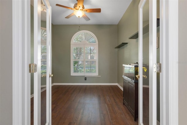 entrance foyer featuring ceiling fan, french doors, baseboards, and dark wood-style floors