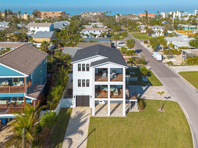 aerial view featuring a residential view and a water view