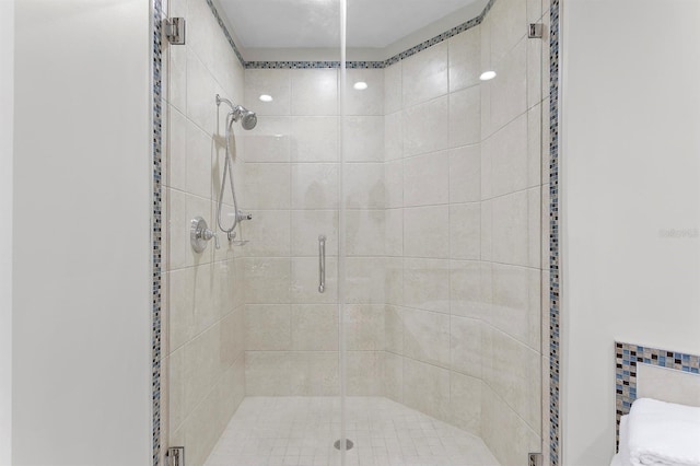 full bathroom with a shower stall