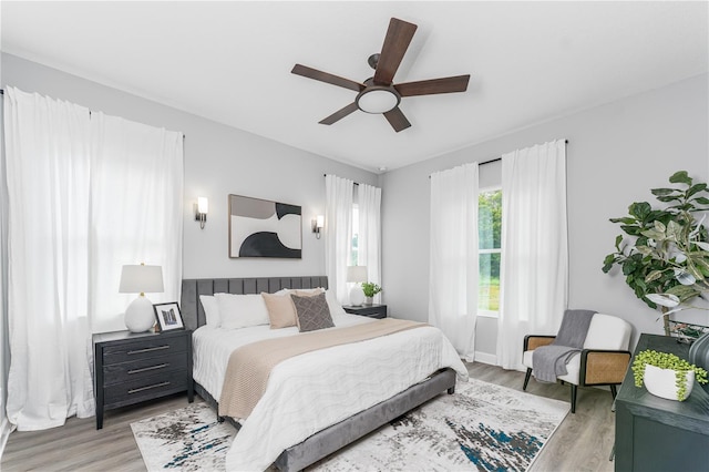 901 Eagle Ln, Apollo Beach, FL 33572 - bedroom with light wood-type flooring and ceiling fan