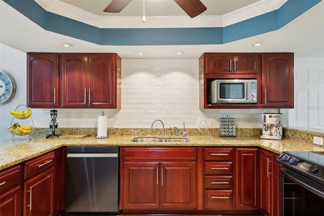 kitchen with a sink and reddish brown cabinets