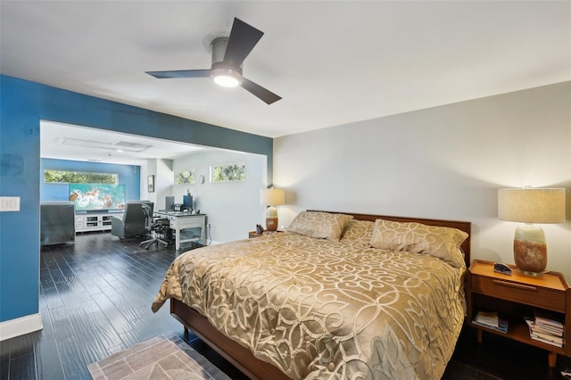 bedroom with baseboards, wood finished floors, and a ceiling fan