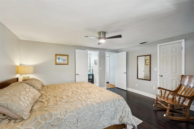 bedroom featuring a ceiling fan, dark wood-type flooring, baseboards, and visible vents