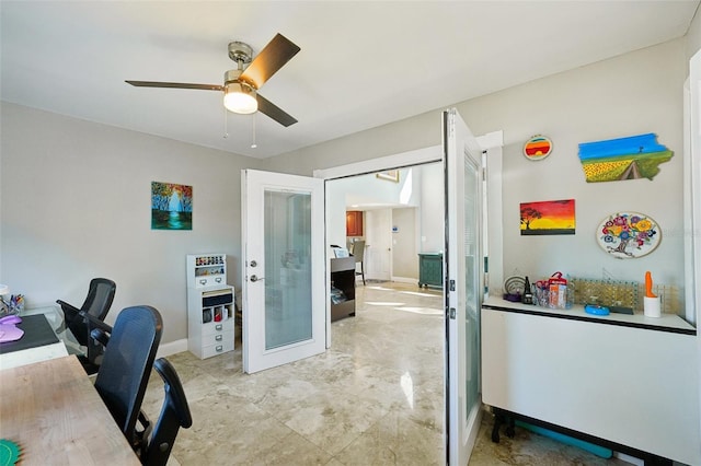 office area featuring french doors, baseboards, and ceiling fan