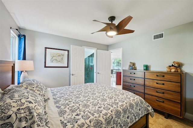 bedroom with a ceiling fan and visible vents