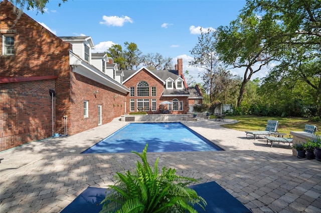 pool featuring a patio