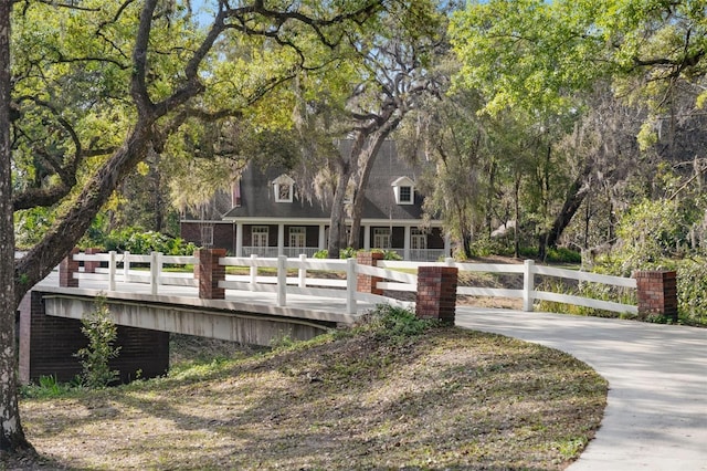 back of house featuring fence